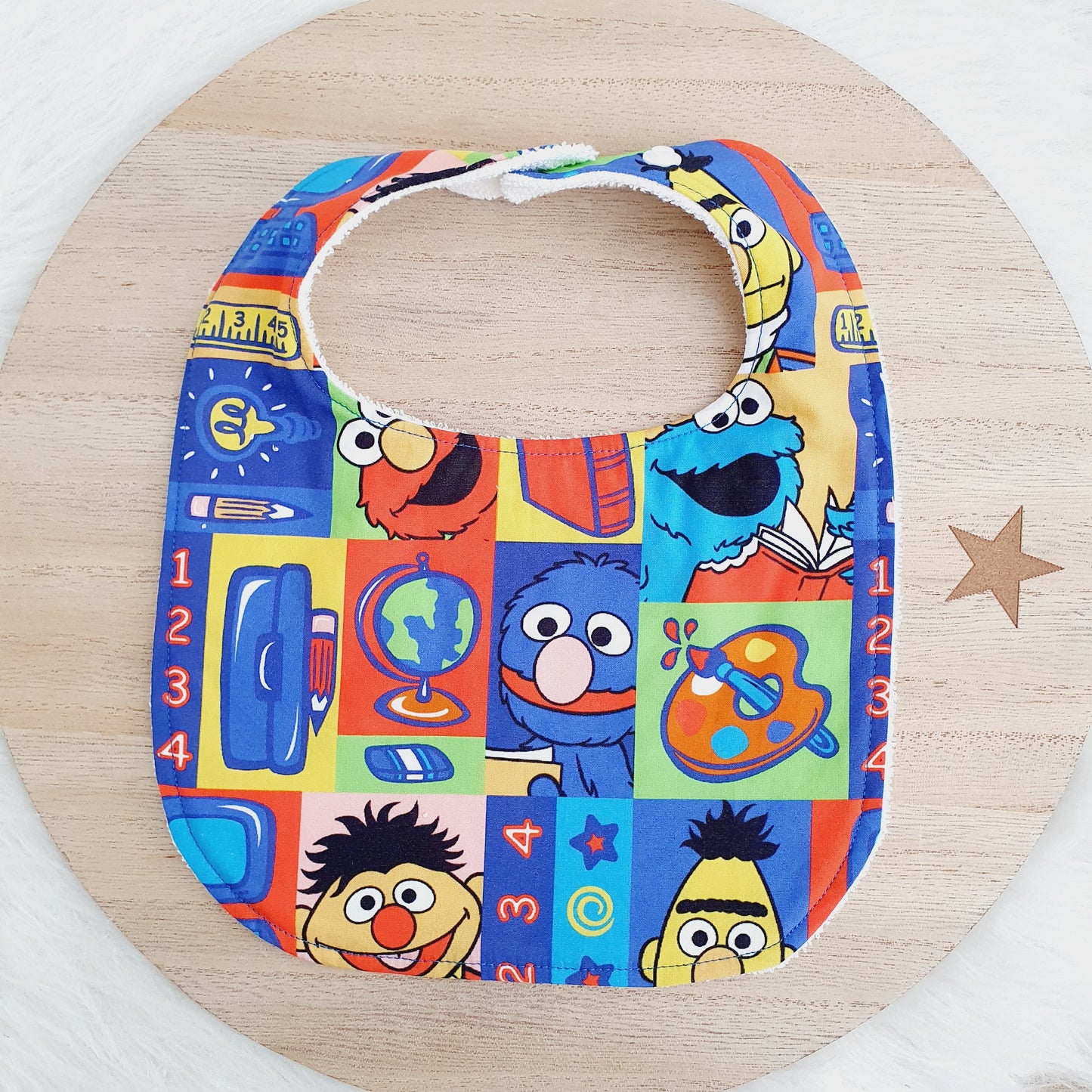 SESAME ST print Small Feeding Bib - Organic Bamboo Backed, Ultra Absorbent Bib