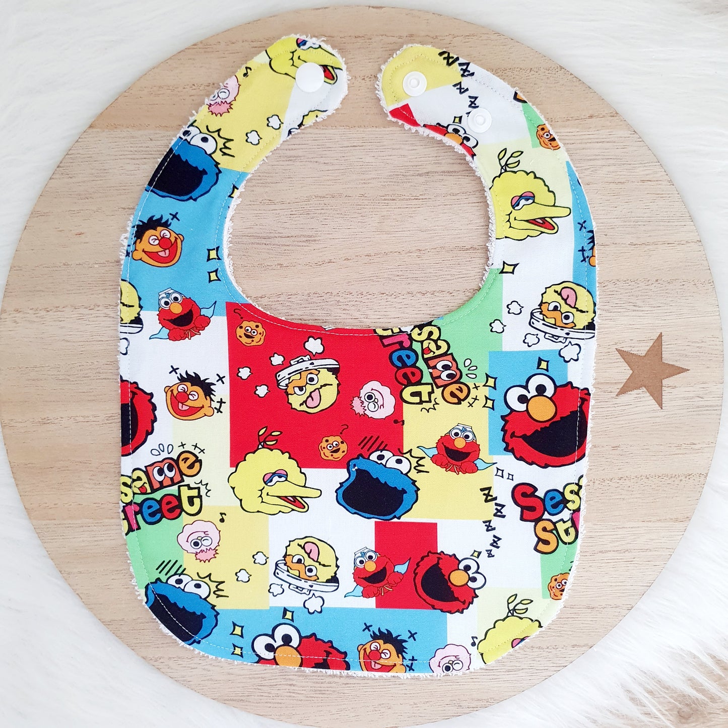 SESAME ST print Small Feeding Bib - Organic Bamboo Backed, Ultra Absorbent Bib